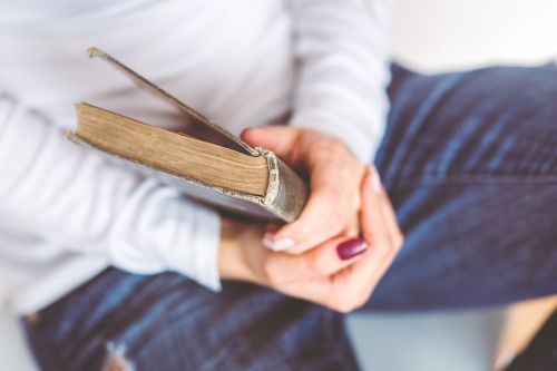 book reading hands