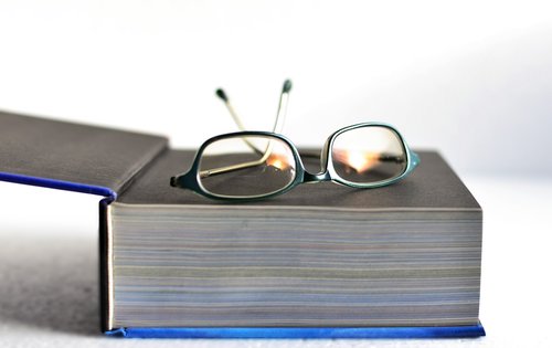 book  glasses  pitched