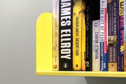 bookshelf yellow books