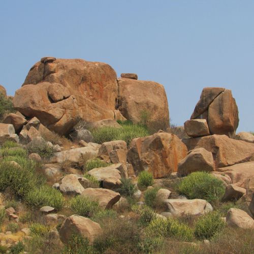 boulders blue sky hampi