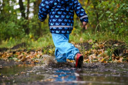 boy puddle autumn