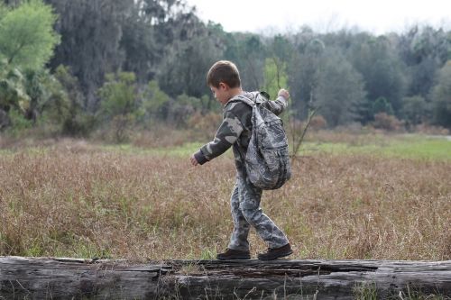 boy camouflage outdoors