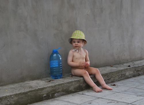 boy water sitting