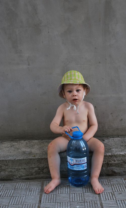 boy water sitting