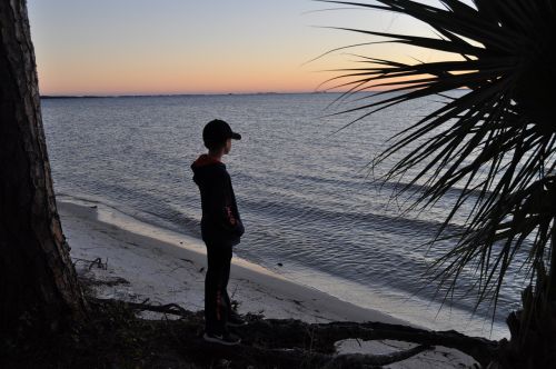 boy gazing bay