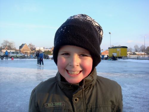 boy happy ice skating