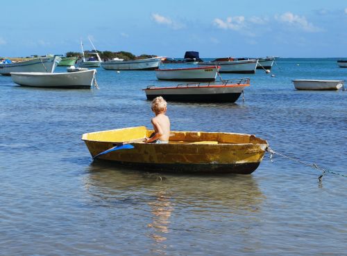 boy boat paddle