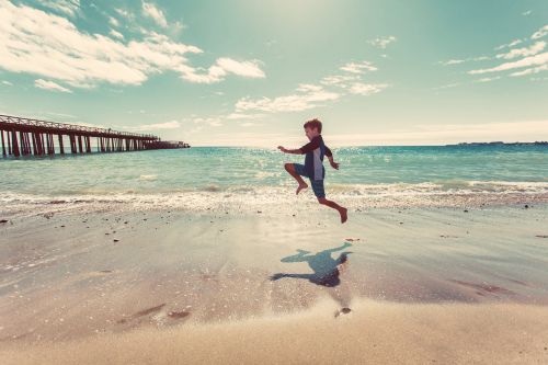 boy beach sand