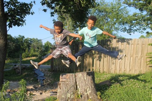boys twins jumping