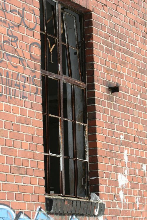 brick wall window graffiti