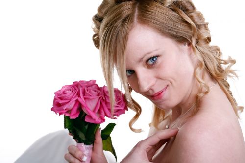 bride smiling flowers