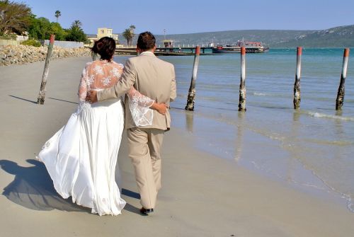 bride and groom wedding beach