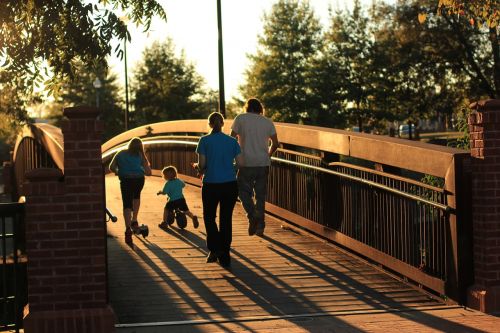 family bridge sunset