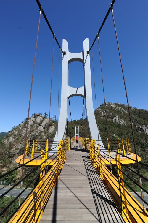 bridge suspension bridge mountain