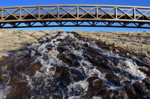 bridge stream waterfall