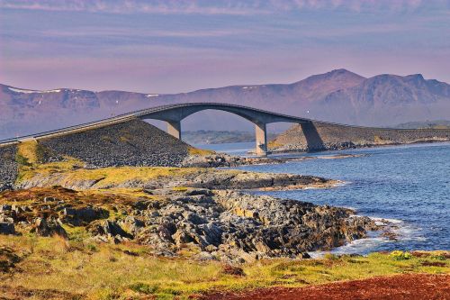 bridge mountains ocean