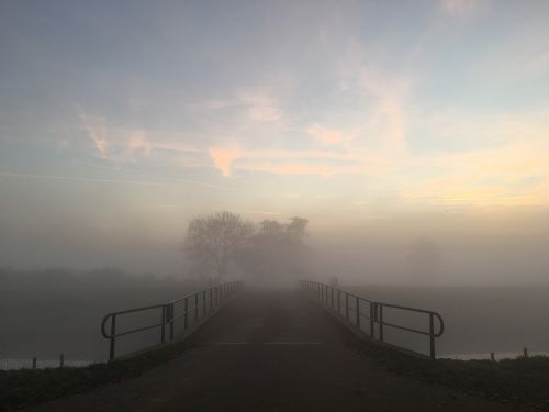 bridge foggy sunset
