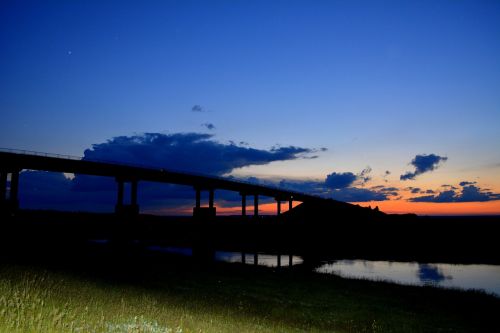 bridge sunset water