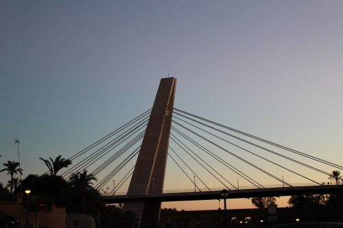 bridge river sunset