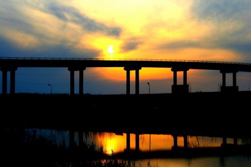 bridge sunset water
