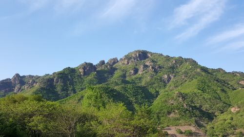brightly lit mountain scenery spring