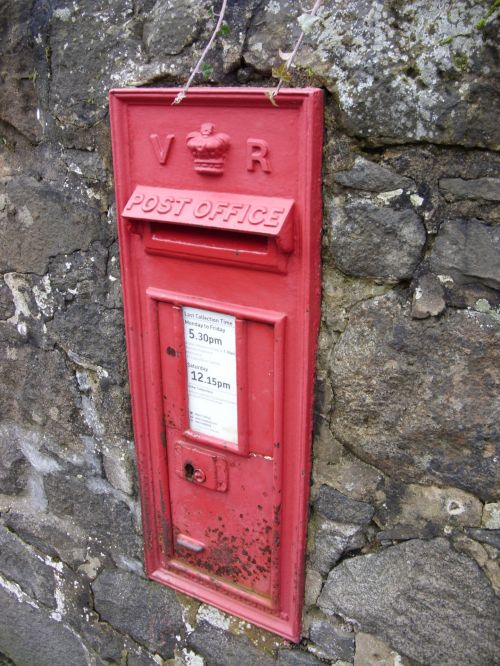 British Red Post Box In Wall