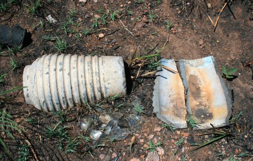 Broken Pots In Cemetery