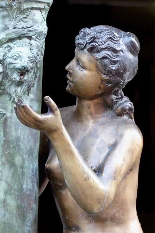 bronze statue woman lion