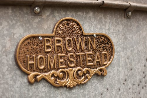 brown  homestead  sign