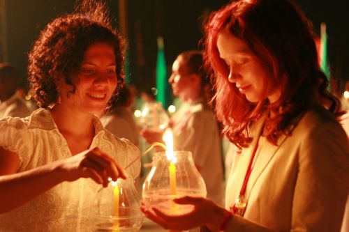 buddhists women candles