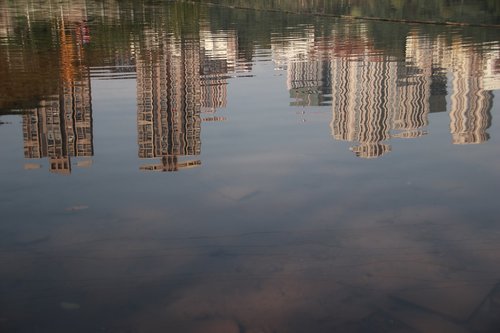 building  reflection  the water