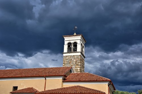 building  tower  clouds