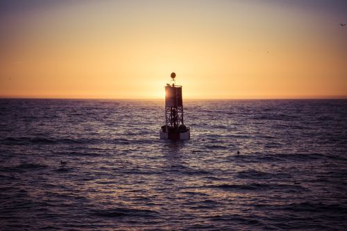 buoy sunset ocean