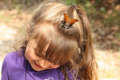 Butterfly On Child&#039;s Head