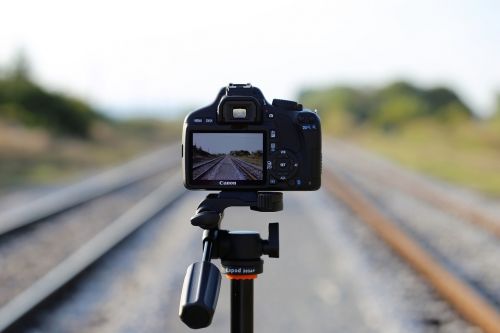 camera on railway photo on rail far distance