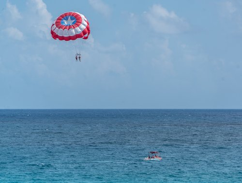 cancun  mexico  parasailing