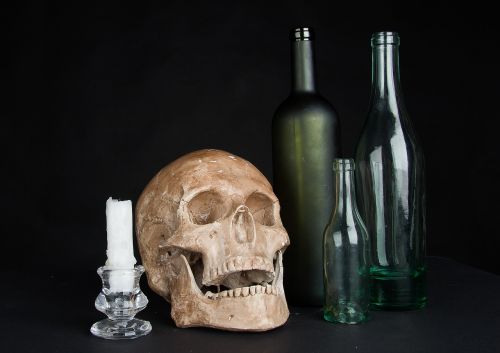 candle the bottle skull