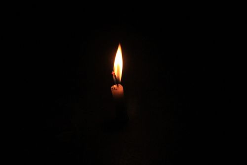 candlelight shadow black background