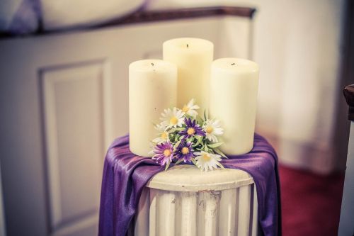 candles purple flowers