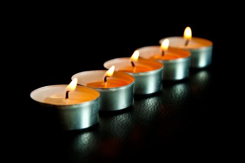 candles  black background  light