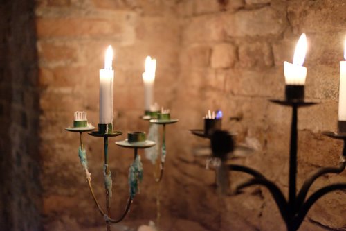 candles  tea lights  brick wall