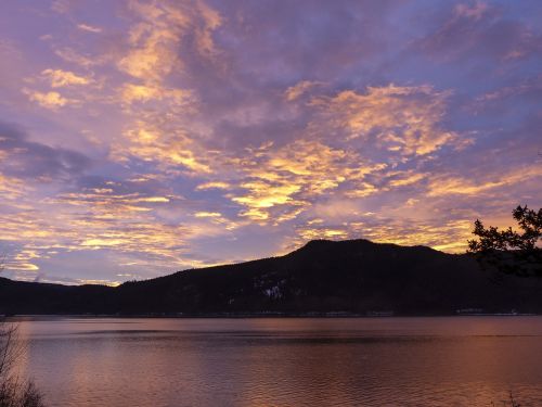 canim lake sun rise clouds