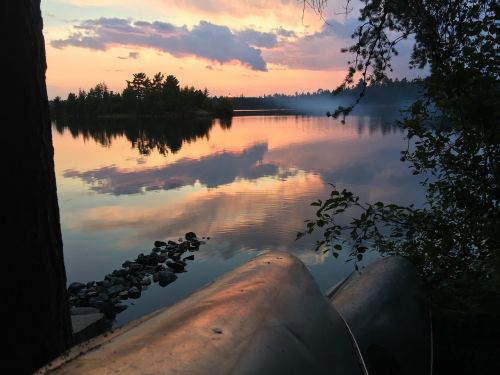 canoeing camping sunset