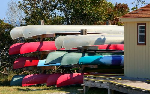 canoes boats boathouse