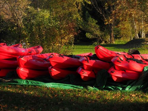 canoes boats red