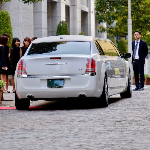 car white  long  limousine