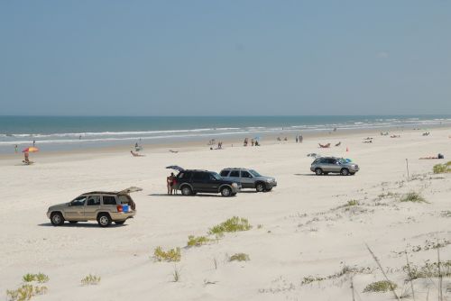 cars on the beach beach parked