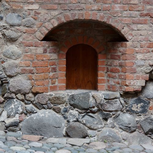 castle door door recess brick wall