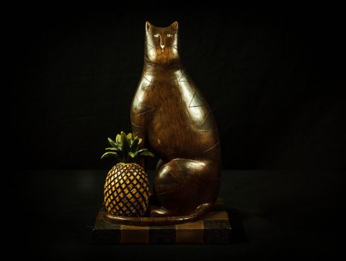 cat pineapple carved wood