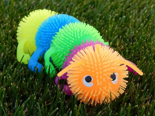 caterpillar toy grass